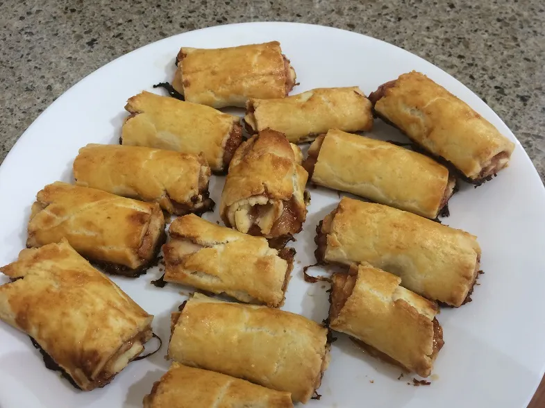 rolled gluten free pastries on tray