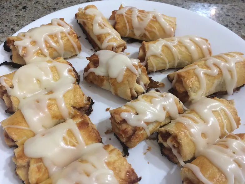 rolled gluten free pastry with icing