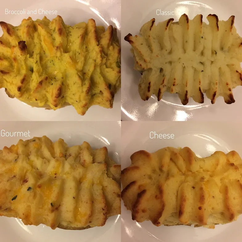 photo showing all four of m & m's different stuffed potatoes cooked and on plates