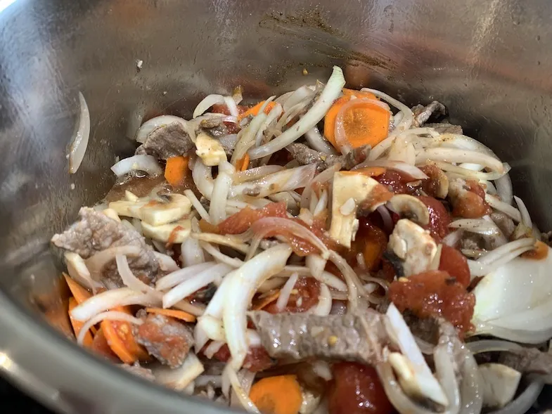 photo of all ingredients for gluten free hayashi rice mixed together in pot