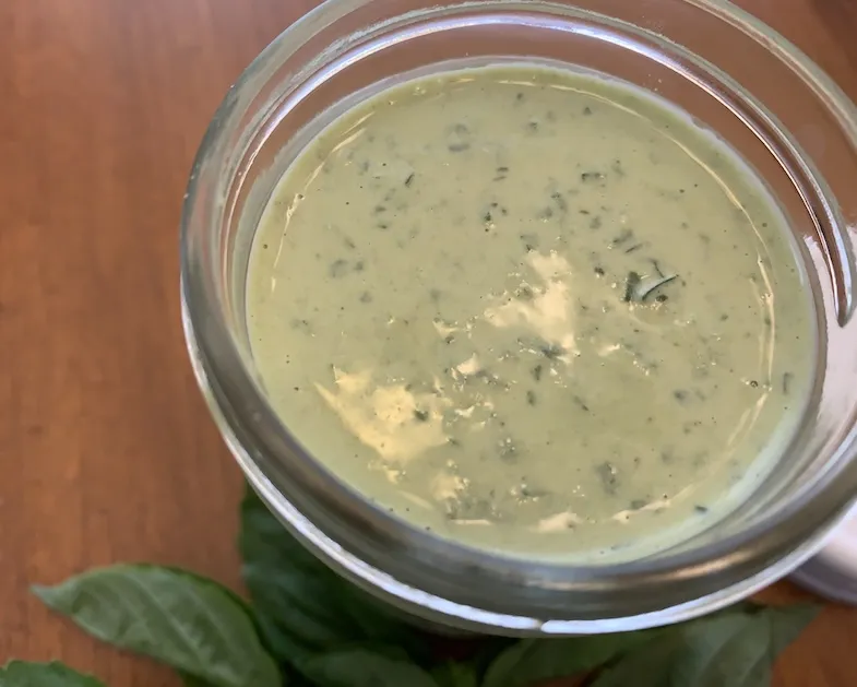 close up of green tahini dressing