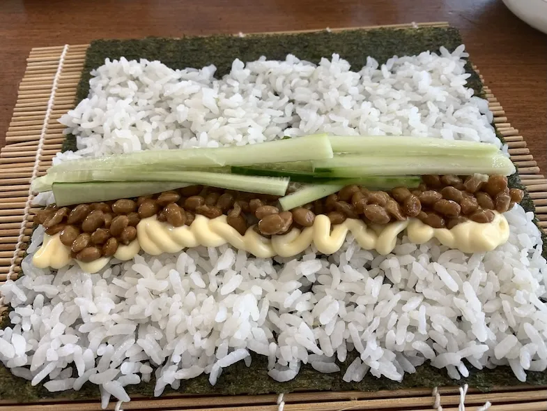 thinly sliced cucumbers on the maki sushi