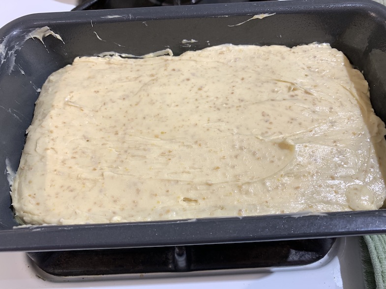 gf bread dough in pan