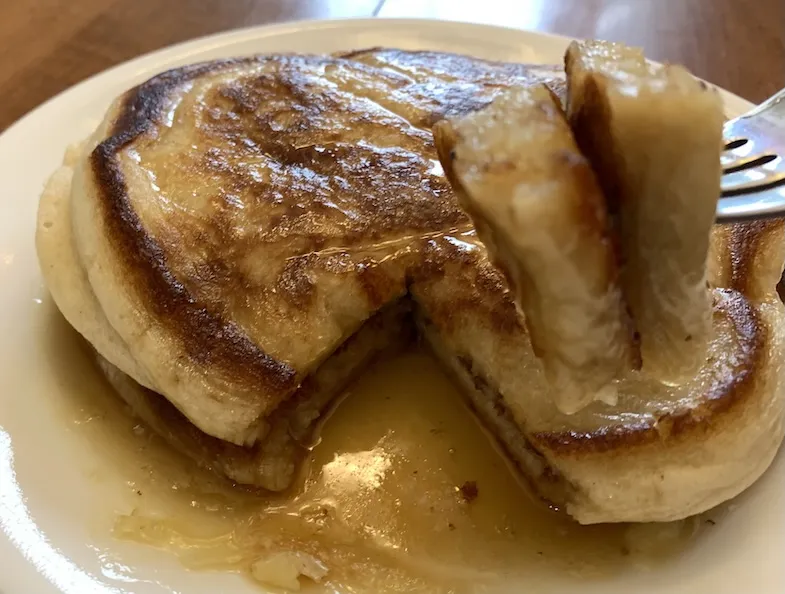 gluten-free pancake with a piece cut out on a fork