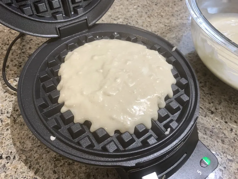 gluten-free waffle batter in the waffle maker