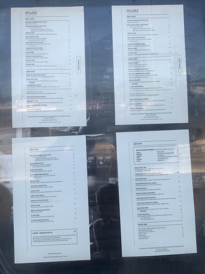 Menu on display in window at Notable