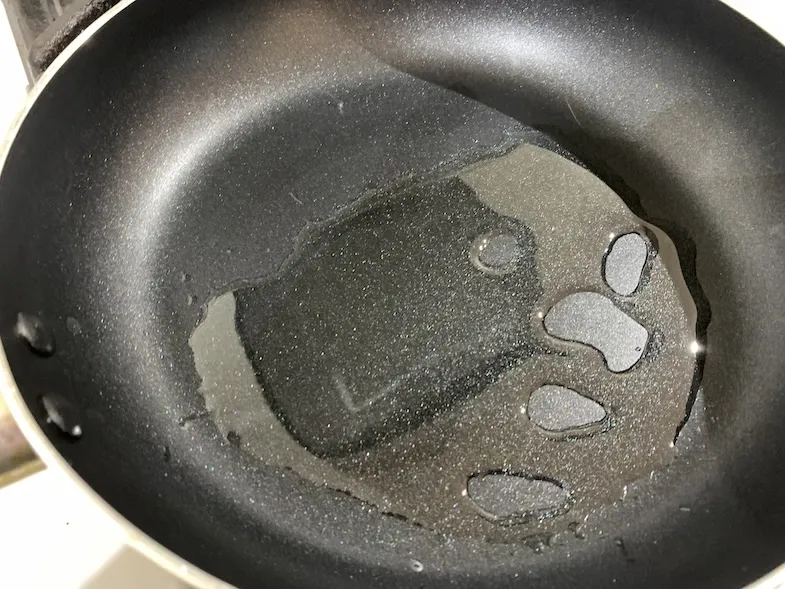 oil heating in a small frying pan