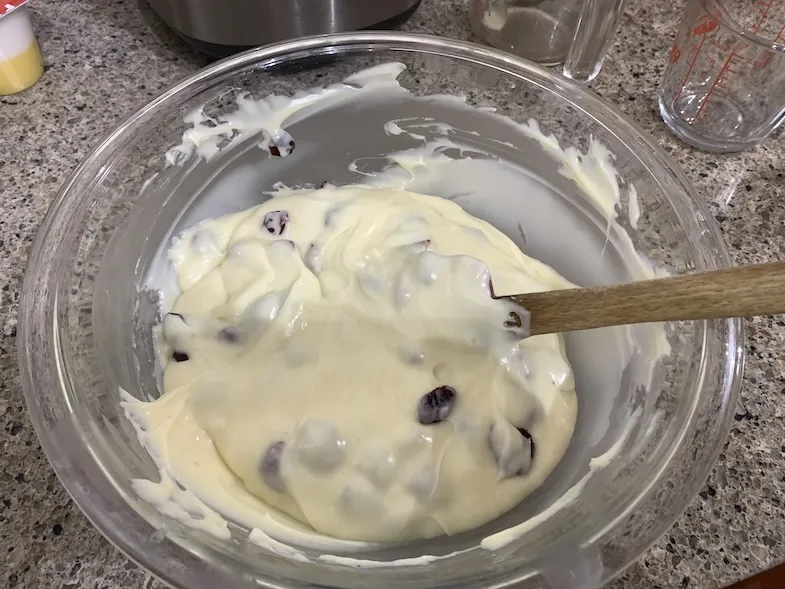 white chocolate and cranberry fudge mixed in a bowl