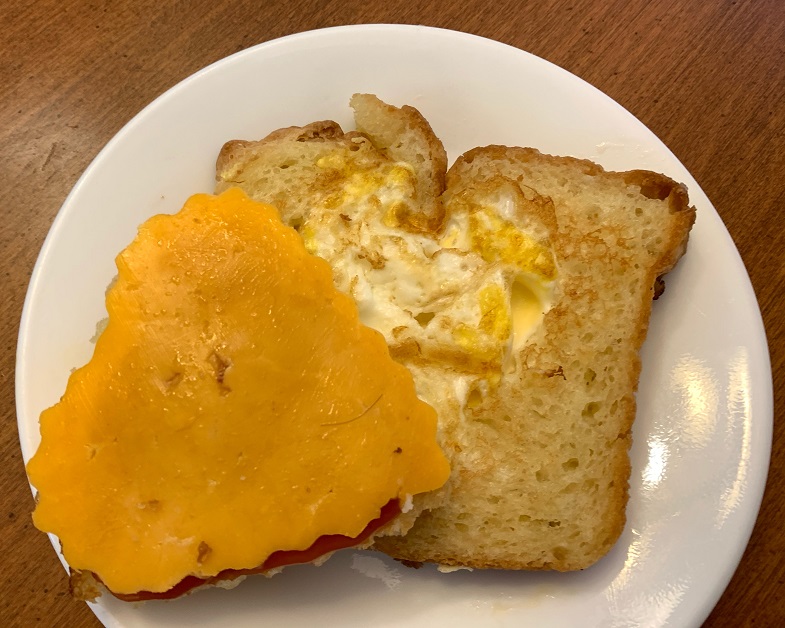 egg with heart shape and cheese